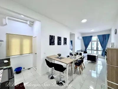 a kitchen and dining room with a table and chairs at BBC Anderson Soo Homestay in Ipoh