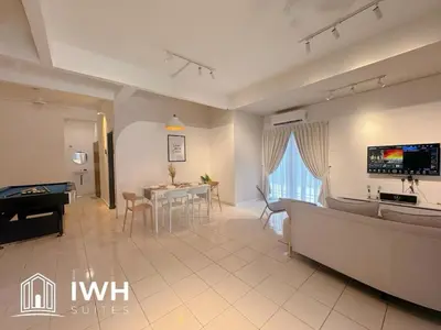 a living room with a couch and a table at Waterfall Guesthouse 4R3B 12pax 3Car KTV BBQ Pool table in Ipoh
