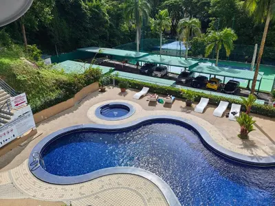 an overhead view of a swimming pool at a resort at Batu Ferringhi Sri Sayang in Batu Ferringhi