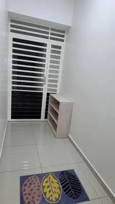 a room with a window and a rug on the floor at Horizon Luxe WiFi n KTV in Sitiawan