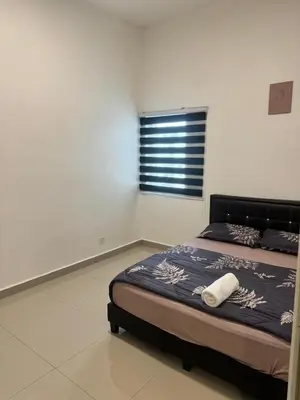 a bed in a room with a window and a bed sidx sidx sidx at Ayaan FIFA Hub Quintet House - Ultimate Gaming Stay in Tanah Rata