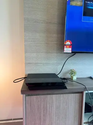 a laptop computer sitting on top of a desk at Ayaan FIFA Hub Quintet House - Ultimate Gaming Stay in Tanah Rata
