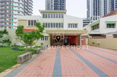 a building in a city with tall buildings at 8 Concordia by YourSuperHost in George Town