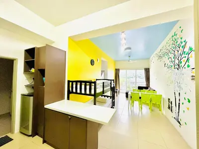 a kitchen and dining room with a childs bedroom at Homestay Golden Hills in Brinchang