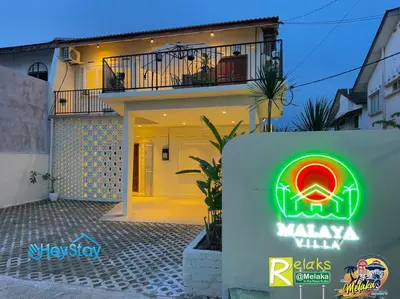a sign for a villa in front of a house at MalayaVilla 5R3B16Pax PrivatePool Karaok PlayGround in Gua Sai