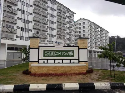 a sign in front of a large building at Aurora Inap Stay for Mslim Only in Cameron Highlands