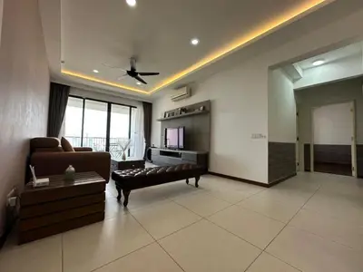 a living room with a couch and a television at Spacious Comfy 8pax, 3 Bedroom, 2 Car Park, The Landmark in Tanjong Tokong