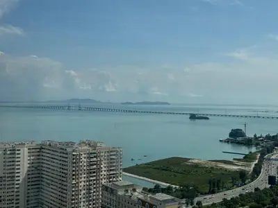 a view of a large body of water with a bridge at Luxury 3BR Seaview Getaway Perfect for 10 Guests A29 in George Town