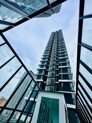 a tall building looking up into the sky at 3BR Seaside Oasis Sleeps 10 Chic & Spacious A29 in George Town