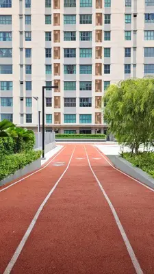an empty red treadmill in front of a building at Brand NEW Modern Cozy Retreats 3BR2B2P for 6 in Batu Kawan