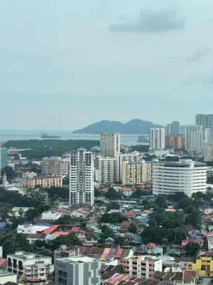 a view of a city with tall buildings at 22 Macalisterz 2025 Georgetown Premium \u9876\u697c\u65e0\u8fb9\u6cf3\u6c60 in George Town
