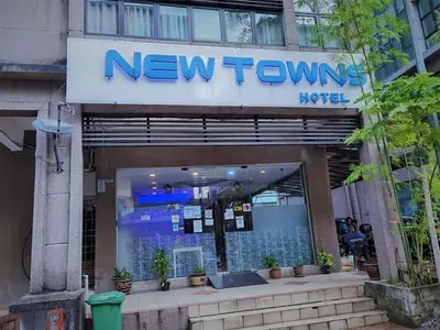 a new journey logo on the front of a building at NewTaunsHotel in Gua Sai