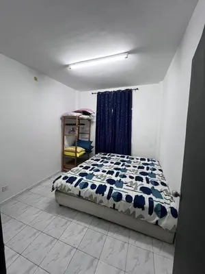 a bedroom with a bed in a room at Dheaa's Homestay Cameron Highlands in Tanah Rata