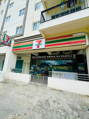 a store front of a building with a sign on it at Rich field Cameron Highlands Homestay-Peony Square-3BDR 2BTH-8PAX in Cameron Highlands