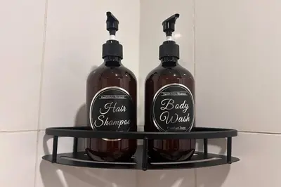 two bottles of wine sitting on a shelf at City Sea View 2R2B Georgetown Gleneagle 9pax in George Town