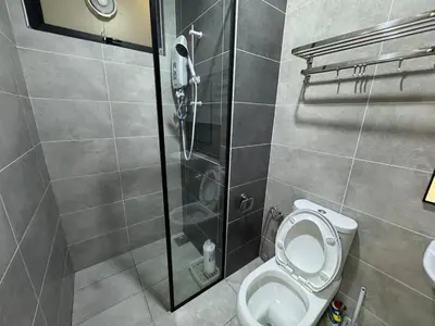a bathroom with a shower and a toilet at Simple Stay Aston Acacia Bukit Mertajam in Bukit Mertajam