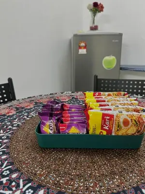 a tray of food sitting on top of a table at Aileen Homestay Swimming Pool in Batu Gajah