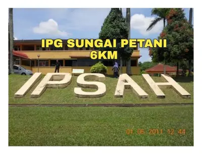 a sign that says spa in front of a building at Ulie Empire Homestay in Sungai Petani