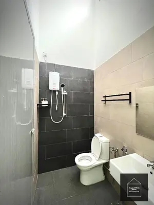 a bathroom with a shower and a toilet and a sink at Homestay Meru Ipoh Mus Lim Only Tropical White House in Ipoh