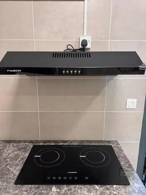 a stove top oven sitting on top of a counter at ICC Suites Ipoh City Centre Walking Distance to Shopping Mall in Ipoh