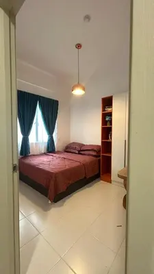 a bedroom with a bed and a window at StudioMimi Near UTP UiTM Seri Iskandar in Seri Iskandar