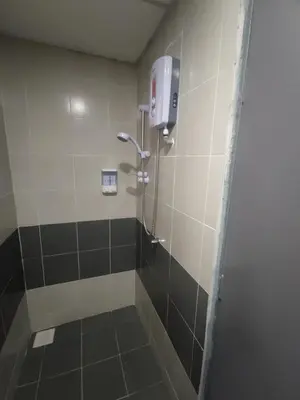 a bathroom with a shower with a soap dispenser at CAMERON HIGHLAND CENRTUM BRINCHANG Homestay By Dcozy 6-7pax in Brinchang