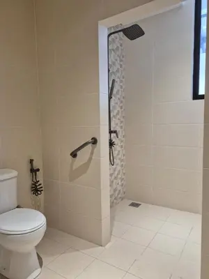 a shower stall in a bathroom with a toilet at Mega Seaview Escape - Butterworth Penang in Butterworth