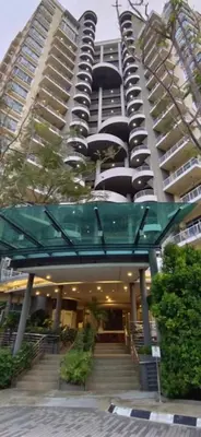 a large building with a lot of cars on it at Deluxe Apartment CintaSayang Resort in Sungai Petani