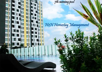 a view of two tall buildings and a swimming pool at H2H - Majestic A19 stay station - 5pax in Ipoh