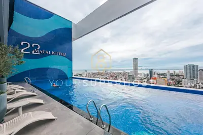 a swimming pool on the roof of a building at 22 Macalisterz by YourSuperhost in George Town