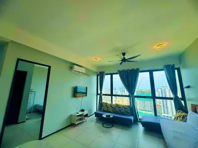 a living room with a ceiling fan and large windows at urban suites 3BR 10pax b30 infinity pool in Jelutong