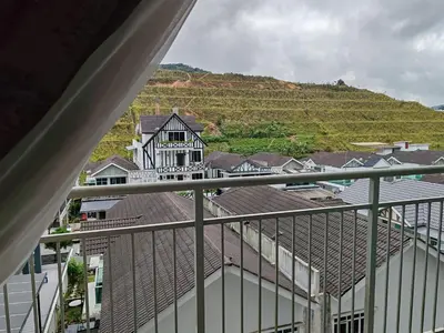 a view from the balcony of a building with a mountain at Studio BARRINGTON SQUARE II in Brinchang