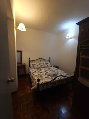 a bedroom with a bed in a room at Nina's Apt Parkview CH in Tanah Rata