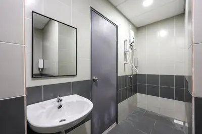 a bathroom with a sink and a mirror at Emerald Avenue Brinchang Near Centrum- Cozy Family Stay Clover Home 5-06 in Brinchang