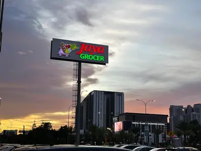 a sign for a j salsa grocery in a parking lot at NEW Bt Kawan8 3BR Suite-IKEA-UOW-KDU-ColumbiaAsia in Simpang Ampat