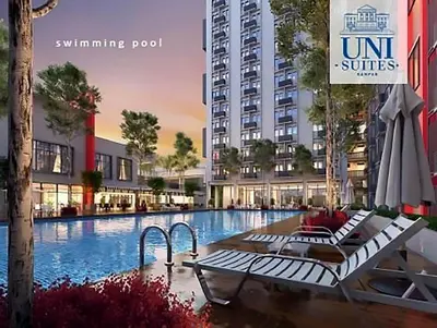 an image of a swimming pool in a building at Unisuites Kampar Studio UTAR TARC -3pax, Pet Friendly, FREE 1 Carpark & Netflix in Kampar