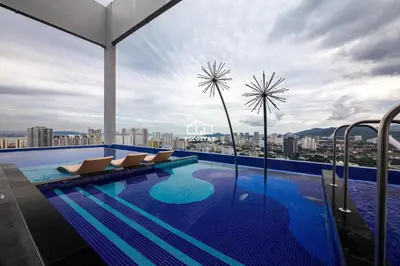 a swimming pool on the roof of a building at M22 #CityView SeaView #Georgetown #35 in George Town