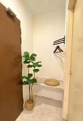 a plant sitting on a shelf in a bathroom at Sembilan Inn by Soft Loft in George Town