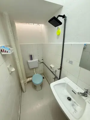 a small bathroom with a toilet and a sink at SZ Homestay Near KPJ Hospital in Kampong Permatang Batu