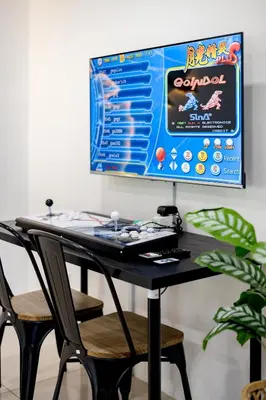 a computer monitor on top of a desk at i Homes Villa 3 Nearby Sunway - Swimming Pool and Karaoke in Ipoh