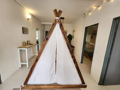a teepee tent in a living room at Cameron Highland 915 Glamping Style 3BR 10 Pax in Brinchang