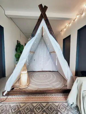 a bed with a white tent in a room at Cameron Highland 915 Glamping Style 3BR 10 Pax in Brinchang