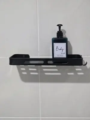 a soap dispenser on a shelf in a bathroom at d01 The Anderson Ipoh Family Stay 2BR in Ipoh