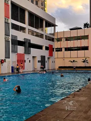 a group of people swimming in a swimming pool at a04 The Anderson Ipoh Family Stay 2BR in Ipoh