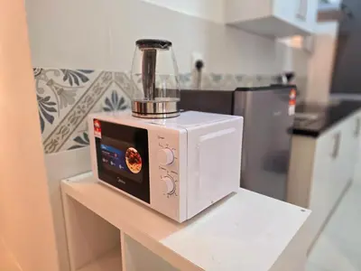 a blender sitting on top of a counter in a kitchen at d15 The Anderson Ipoh Family Stay 2BR in Ipoh
