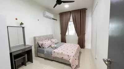 a bedroom with a bed and a mirror and a window at Puteri Resident In Stay in Sungai Petani