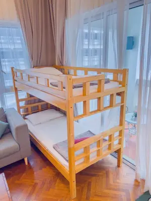 a couple of bunk beds in a room at Straits Quay By The Marina 1BR Family Suite in Tanjong Tokong
