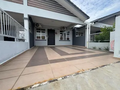 a house with a tile driveway in front of it at Sour'd Staycation Near Teluk Senangin Beach in Kampong Batu Tiga