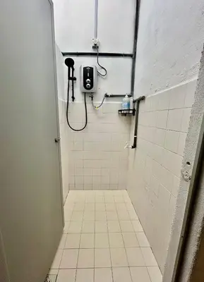 a bathroom with a shower stall with a toilet at Cozyindah11A#7pax#netflix#NearAeonAlma#BukitMertajam in Bukit Mertajam