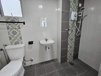 a bathroom with a toilet and a sink at Ipoh Anderson Condo - 2BR in Ipoh